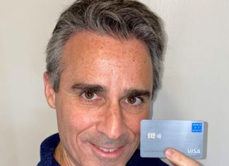 a man holding a credit card