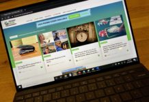 a computer screen with a keyboard and a website on it