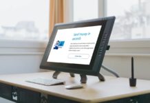 a computer screen on a desk