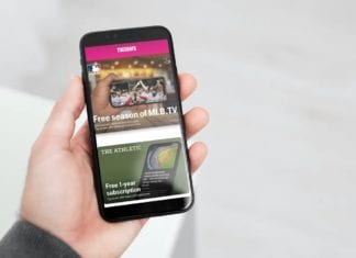 a hand holding a cell phone