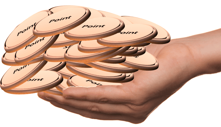 a hand holding a pile of coins