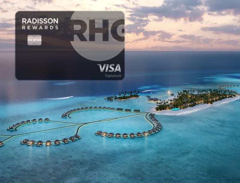 a card with a resort in the water