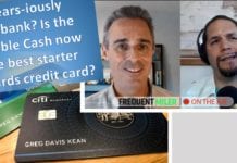 a man with headset and credit card