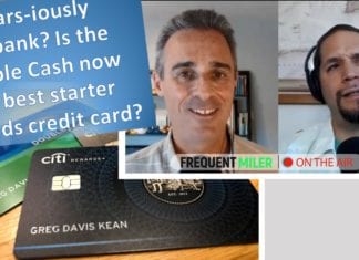 a man with headset and credit card