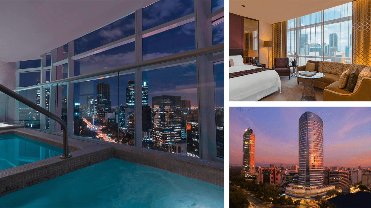 a room with a pool and a view of a city