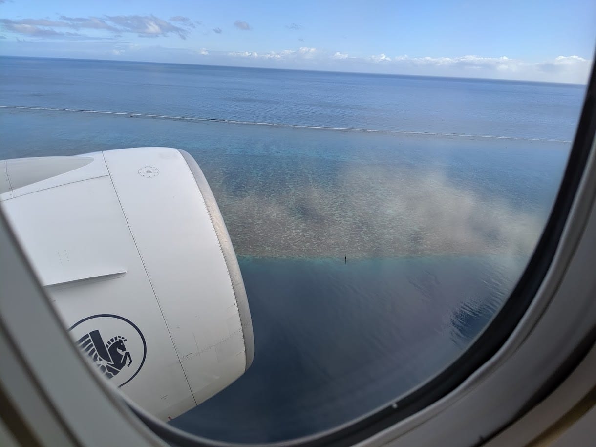 a view of the ocean from a plane window