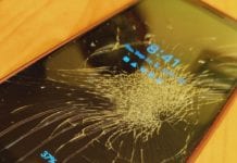 a cell phone with a cracked screen