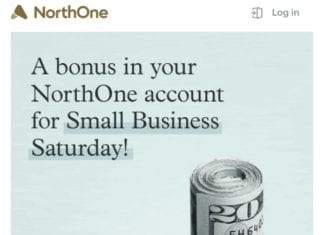 a roll of money tied with a rubber band