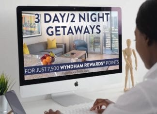 a person looking at a computer screen