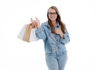 a woman holding shopping bags