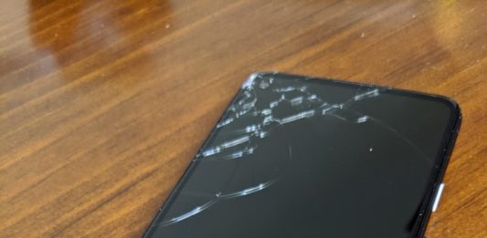 a broken cell phone on a table