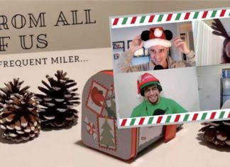 a man wearing a hat and a box with pine cones