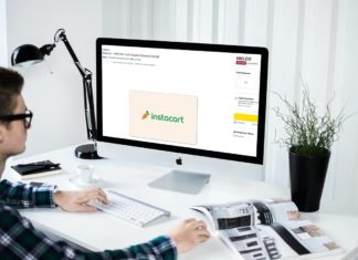 a person sitting at a desk with a computer