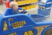 a baby in a toy car