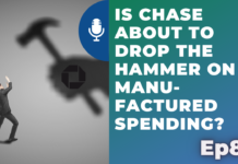 a hand holding a hammer