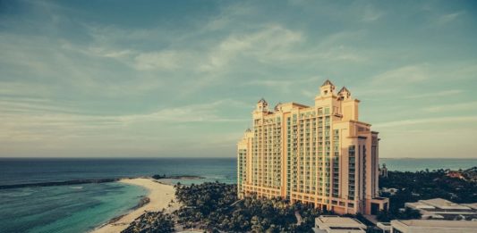 a large building next to a body of water