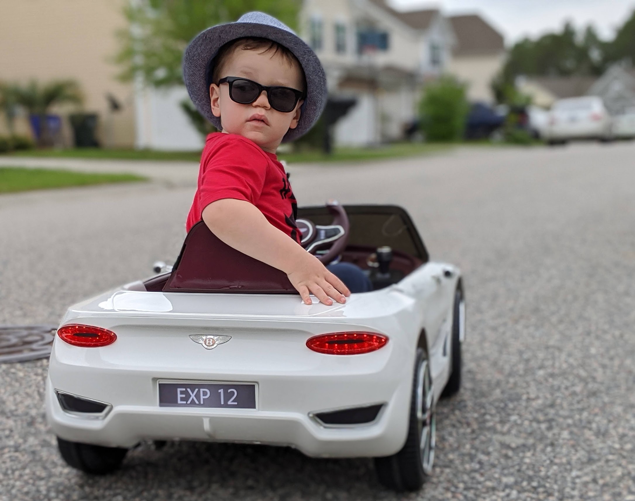 a child in a toy car