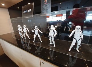 a group of white figures on a counter