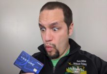 a man holding a credit card