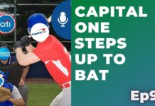 a man holding a baseball bat