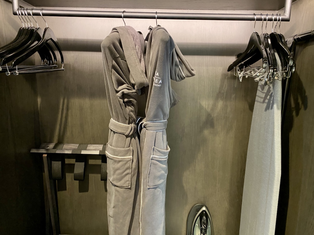 a grey robe on a rack