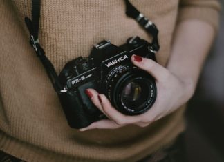 a person holding a camera