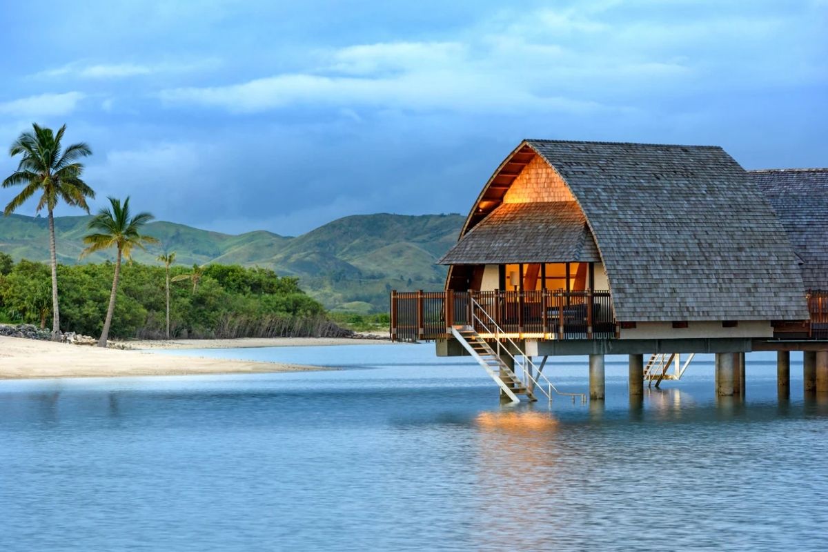 a house on stilts in water