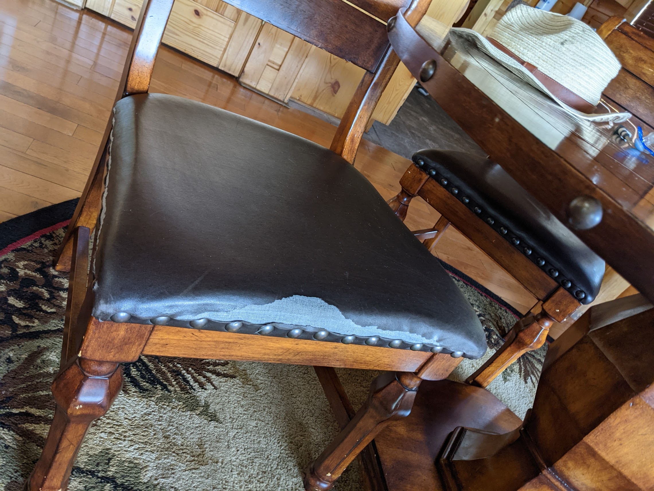 a chair with a black cushion