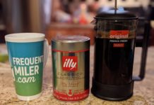 a coffee maker and a mug