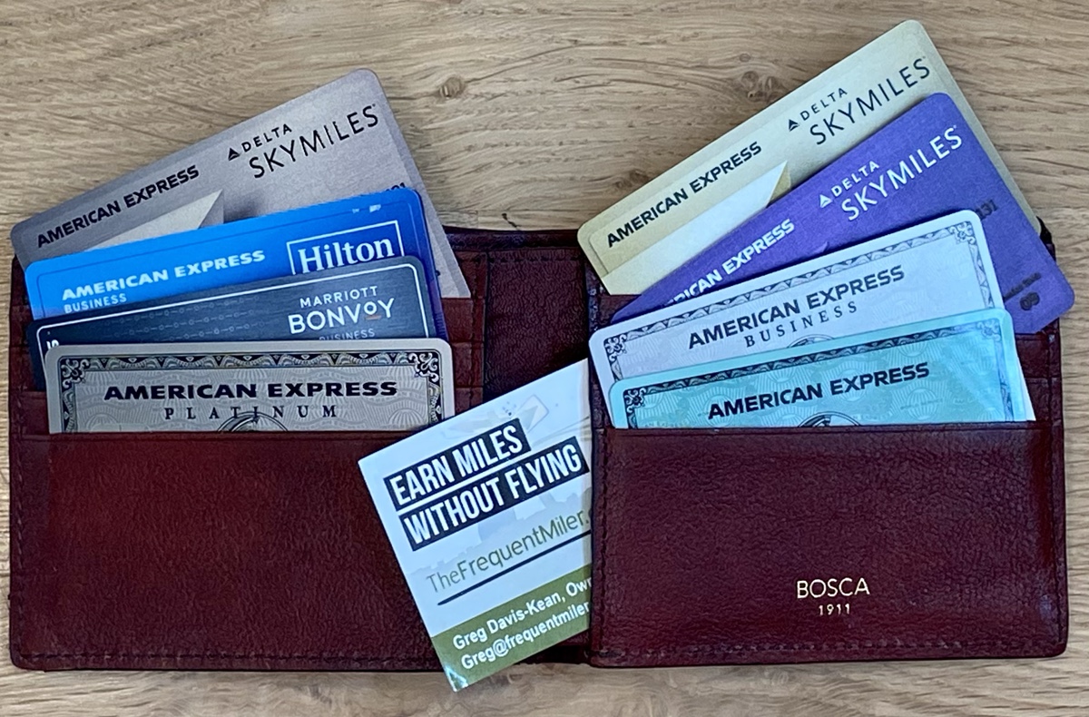 a wallet with credit cards and a few cards in it