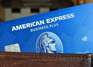 a wallet with a credit card and a credit card inside