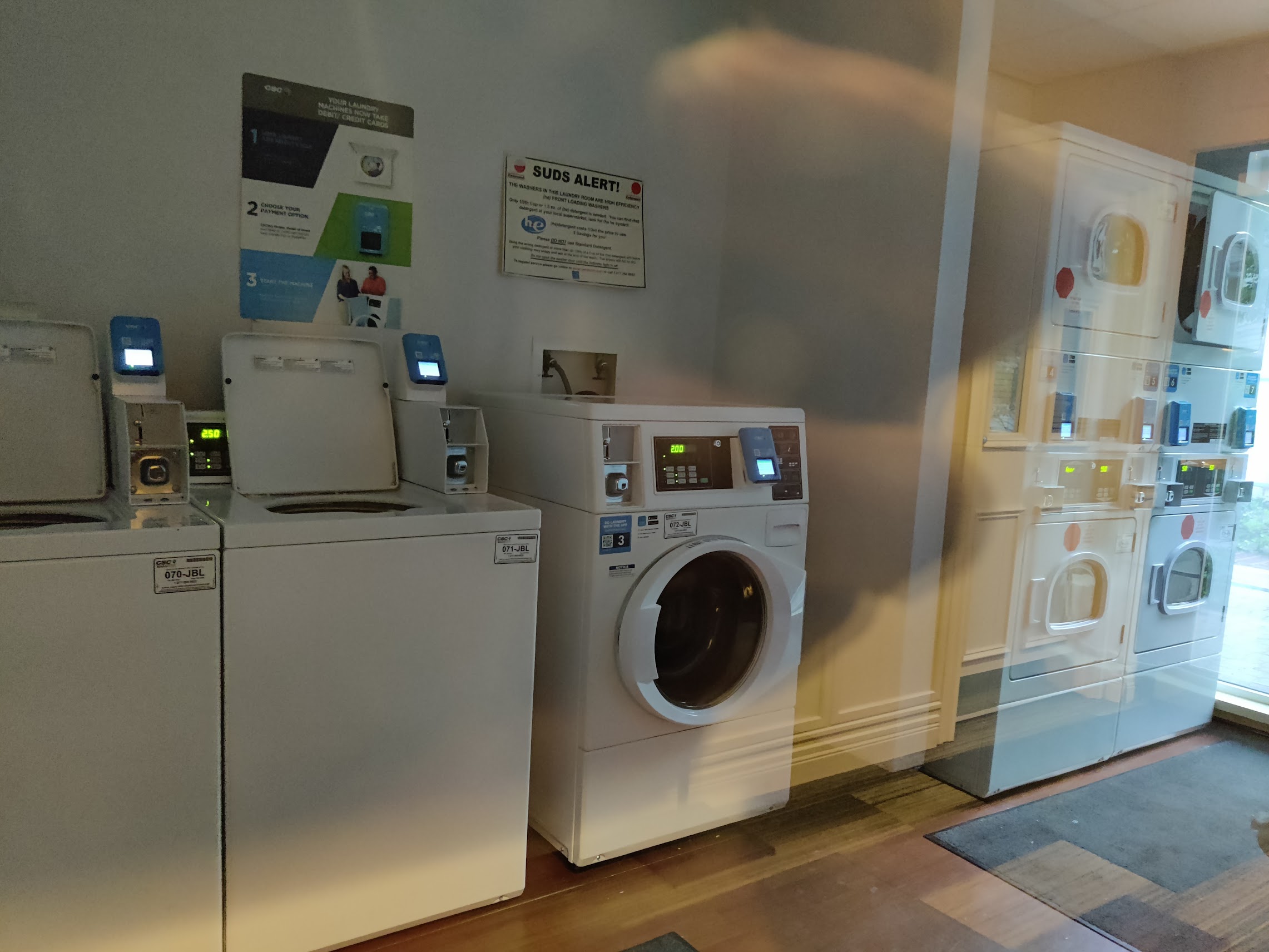 a group of washing machines in a room