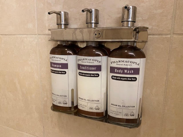 a group of bottles of shampoo and conditioner