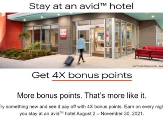 a woman walking in front of a hotel