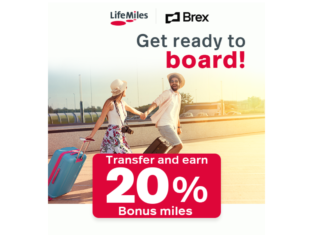 a man and woman holding hands and holding luggage