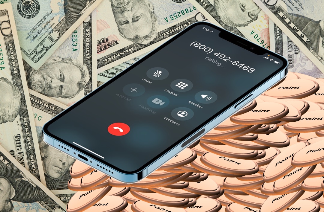 a cellphone on top of money
