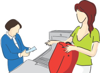 a woman and a boy looking at a piece of paper