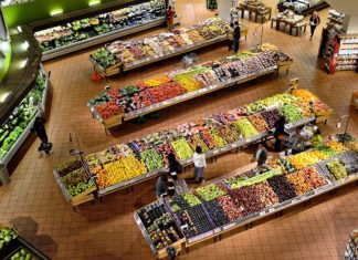 a group of people in a grocery store