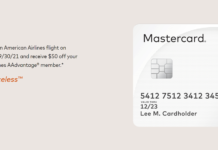 a white card with a chip on it