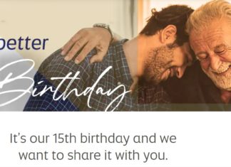 a man hugging another man