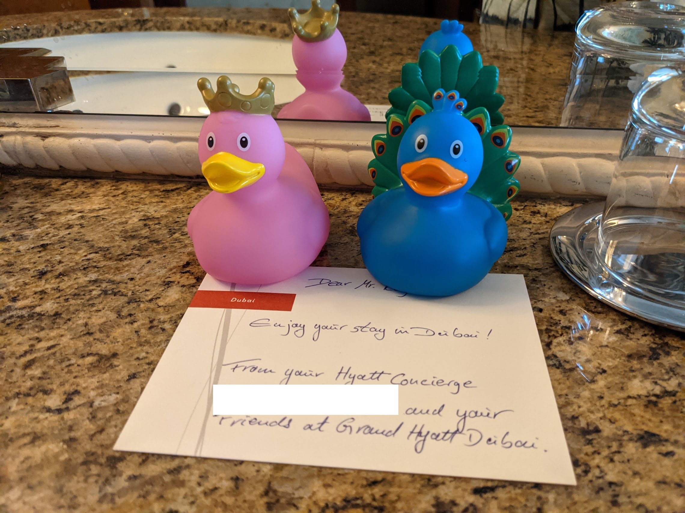 a couple of rubber ducks on a counter