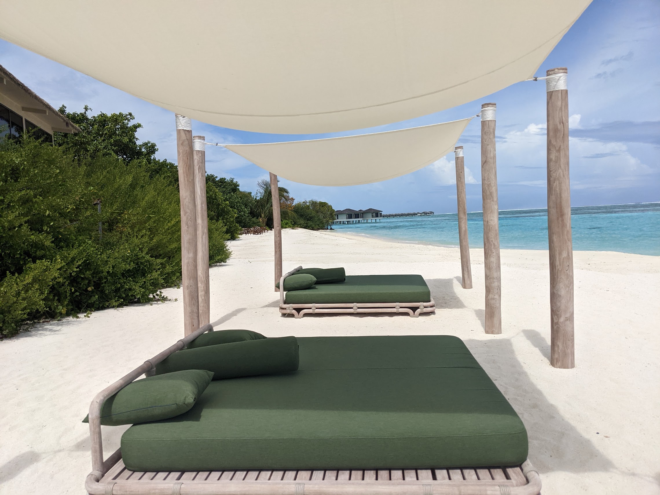 a group of beds on a beach