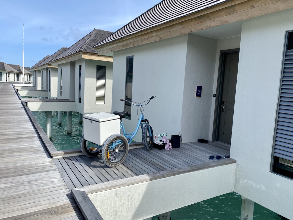 a tricycle parked on a dock