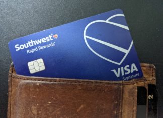 a blue credit card in a wallet