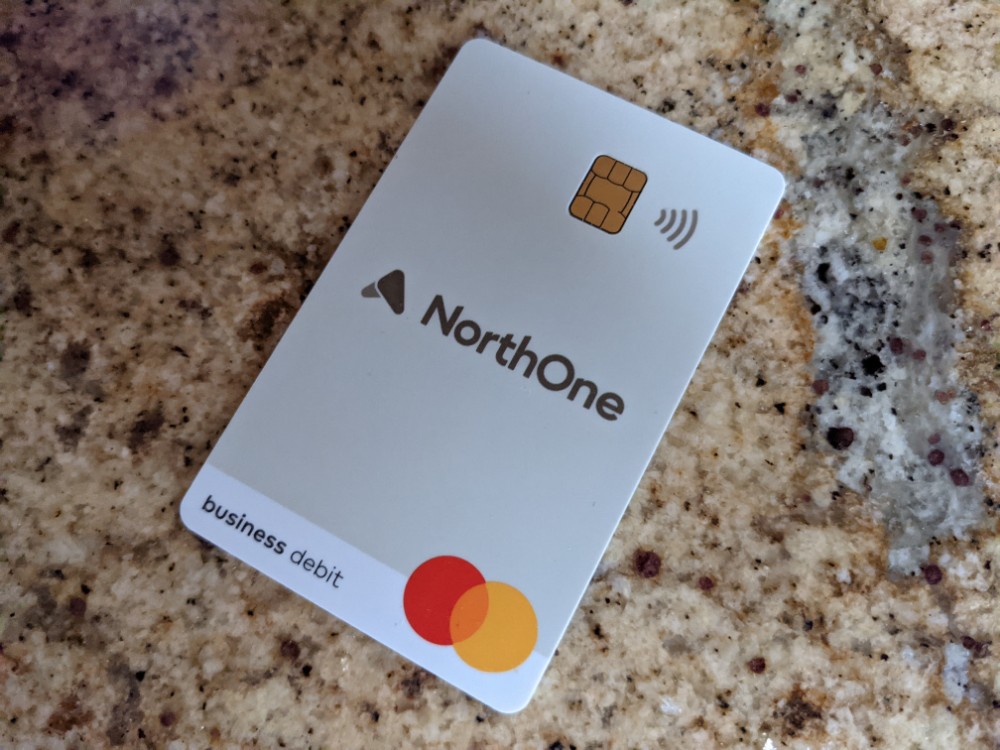 a credit card on a marbled surface