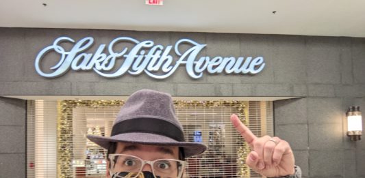 a man wearing a hat and face mask