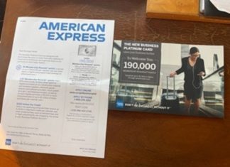 a paper and a flyer on a table