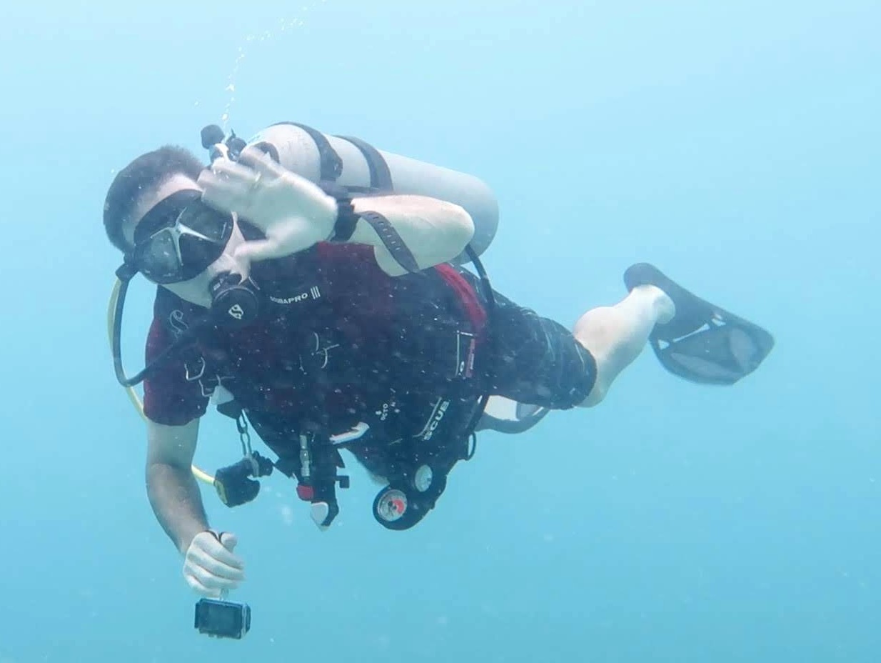 a man in scuba gear underwater