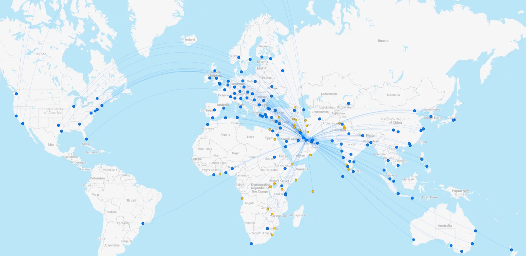 a map of the world with blue and yellow dots