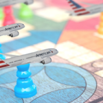 a group of toy airplanes on a game board